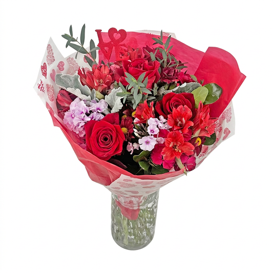 Red Sunset Crush Farm Bouquet in a vase on a white background