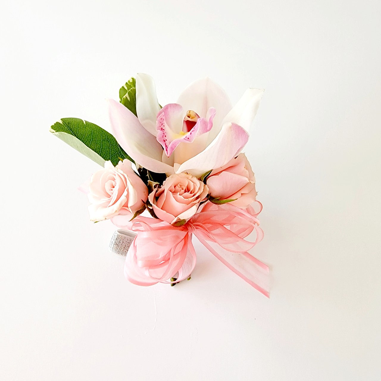 Pink Spray Rose Wrist Corsage With Iridescent Ribbon in Huntsville